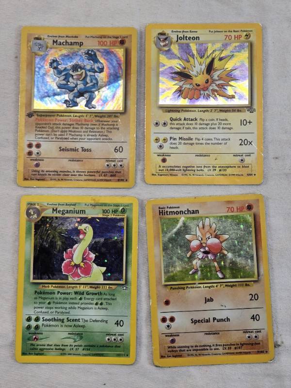 lot 45 image: Lot of Pokemon Trading Cards Jolteon, Hitmonchan, Machamp, and Meganium