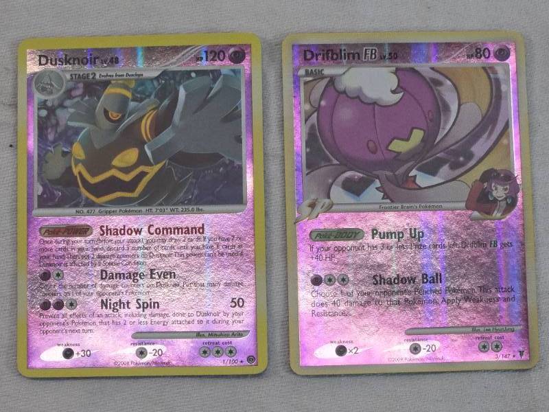 lot 50 image: Lot of Two Holographic Pokemon Trading Cards Dusknoir and Drifblim.