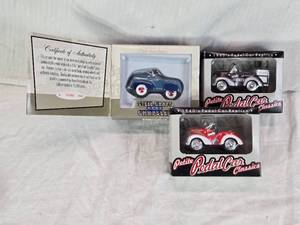 lot 5 image: Steel Craft and Petite Pedal Car Replicas, including 1941 Chrysler and Hersheys Models