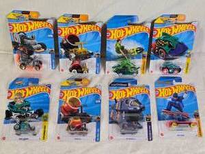 lot 20 image: Hot Wheels Toy Cars including HW Ride-Ons, HW Xtreme Sports, and HW Mega Bite