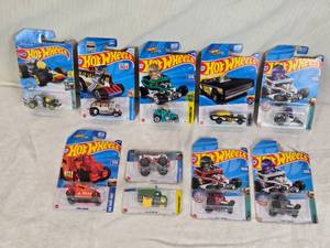 lot 30 image: Hot Wheels Toy Cars Collection including Skull Shaker, Pixel Shaker, Birthday Burner, and Small Bloc