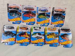 lot 34 image: Hot Wheels Die-Cast Cars Collection including Punk Rod, Slide Kick, Rodger Dodger 2.0, Street Wiener and More