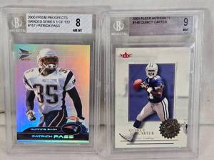 lot 65 image: 2000 Prism Prospects Patrick Pass Rookie card graded 8, 2001 Fleer Authority Quincy Carter card graded 9