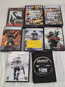 lot 77 image: PC Game Collection including Grand Theft Auto V, Call of Duty, and Crysis