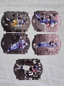 lot 70 image: Lot of 5 1997 Upper Deck Star Atractions Football Cards Featuring Napoleon Kaufman, Barry Sanders, John Elway, Lawrence Phillips, and Curtis Martin