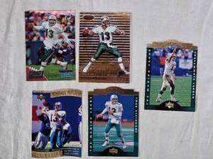 lot 82 image: Lot of 5 Dan Marino Football Cards featuring Upper Deck and Topps sets