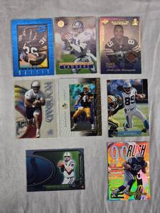 lot 83 image: Lot of 8 Football Cards Featuring Brett Favre, Peyton Manning, Deion Sanders, and Edgerrin James
