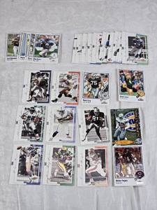 lot 87 image: Lot of Football Cards Featuring Brett Favre, Emmitt Smith, Walter Payton, and Howie Long