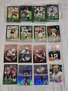 lot 91 image: Large Lot of 2002 Topps Football Cards Featuring Randy Moss, Brett Favre, and Terry Bradshaw with Special Edition and Ring of Honor Features.