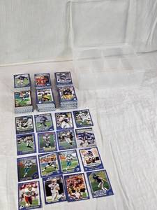 lot 93 image: Huge Lot of 2002 Topps Football Cards Featuring Peyton Manning, Drew Bledsoe, and Ricky Watters Including Plastic Case