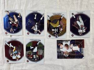 lot 96 image: Lot of 2002 Topps Platinum Football Cards Featuring Tom Brady, Randy Moss, and Jeff Garcia Relic Card