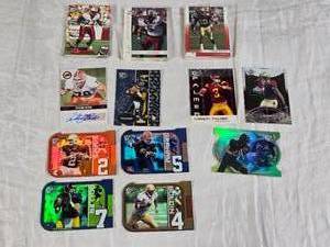 lot 98 image: Lot of Various Press Pass 2002,  2003 Football Sports Cards Including Tony Pashos Auto,  Kyle Boller, Chris Simms, and Carson Palmer