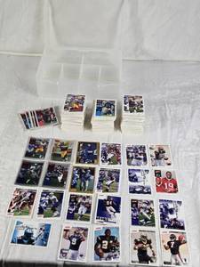 lot 100 image: Huge Lot of Football Cards with Plastic Case from 2000 Upper Deck, 2002 Upper Deck Victory - Including Randy Moss, Michael Vick, Urlacher, Jim Harbaugh and Others