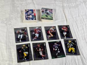 lot 104 image: Lot of 1996 and 1997 Upper Deck Collectors Choice Football Cards Including Chris Carter, Brett Favre and More