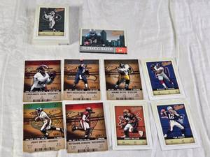 lot 105 image: Lot of 2003 Fleer Authentis Football Cards Featuring Tom Brady, Michael Strahan, Matt Hasselbeck, Jerome Bettis, Keyshawn Johnson, and Ricky Williams