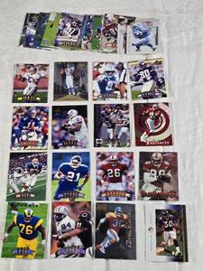 lot 106 image: Lot of Mostly Late 90s Pinnacle Football Cards Featuring Players like Jerry Rice, Terrell Davis, Barry Sanders, Chris Carter and Eddie George