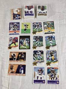 lot 111 image: Large Lot of 2002 Fleer Football Cards Featuring Daunte Culpepper, Jerry Rice, Brett Favre, and Randy Moss