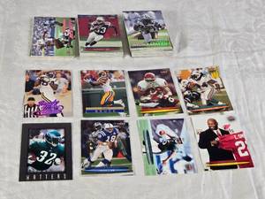 lot 114 image: Lot of Various 1999 Fleer Ultra and Fleer Football Cards Featuring Randy Moss, Peyton Manning, and Emmitt Smith