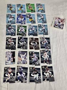 lot 115 image: Lot of 1998 Upper Deck UD Choice and Starquest and Rookquest Football Cards Featuring Randy MossJerry Rice, Brett Favre, and Deion Sanders