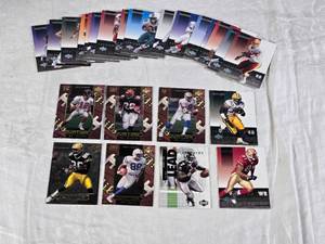 lot 119 image: Lot of 1999 and 2002 Upper Deck Ovation Football Cards Featuring Key Players Including Chris Chandler, Corey Dillon, Marvin Harrison, and Michael Vick