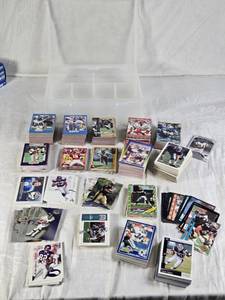 lot 141 image: Huge Lot of Football Cards Late 90s Early 00s Including Vikings Gatorade Cards, NFL Pro Set, Torry Holt, Kerry Collins, and Various NFL Players - Includes Plastic Case