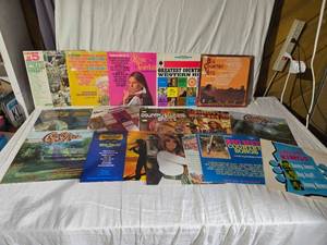 lot 156 image: Country Music Vinyl Records Collection Rose Garden, Greatest Country Western Hits, and Big Country Hits.