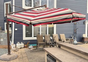 lot 20D image: Treasure Garden 12 Foot Cantilever Patio Umbrella with Red and Black Stripe Canopy