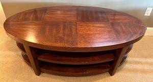 lot 130HH image: ULR - Oval Wooden Coffee Table with Three-Tier Shelving