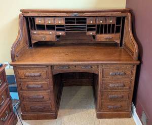 lot 97 image: O - Antique Oak Roll-Top Desk with Carved Details and Multiple Drawers