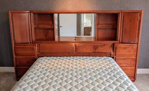lot 151 image: UL - Oak Queen Bed Frame with Headboard, Drawers, and Mirror