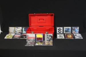 lot 114 image: Collection of 18 Assorted Music CDs with Red Storage Case
