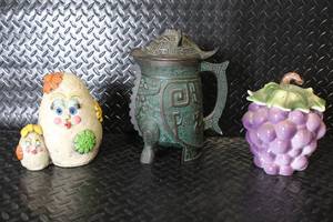 lot 116 image: Collection of 3 Decorative Figurines and Containers - Grape Cookie Jar, Bronze Style Pot, Egg Family Sculpture