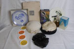 lot 140 image: Eclectic Collectibles Lot Decorative Plates, Binoculars, Coasters, and More