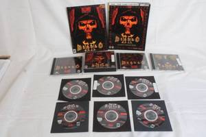 lot 145 image: Diablo II Collectors Lot with Strategy Guide, Game Discs, and Expansions