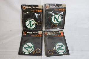 lot 183 image: Lot of 4 Official NHL Minnesota North Stars Vintage Hockey Key Chains