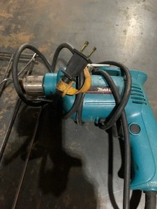 lot 13 image: Makita drill, planers