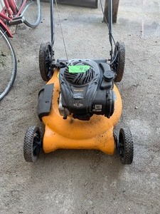 lot 46 image: Poulan pro lawn mower