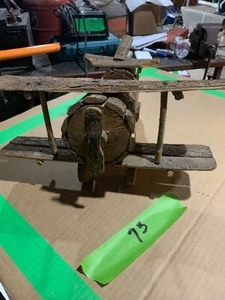 lot 73 image: Wood airplane-handmade