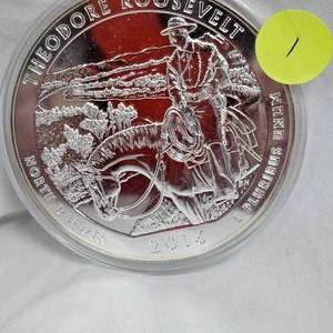 lot 1 image: 5 oz, .999, 2016 Teddy Roosevelt North Dakota Silver Round