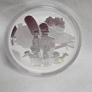 lot 12 image: 2021 1 oz .999 Silver Reverse Simpsons Family