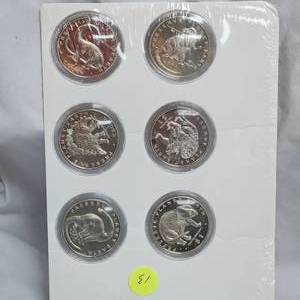 lot 13 image: 1993-6 Planet Earth $1 Coins