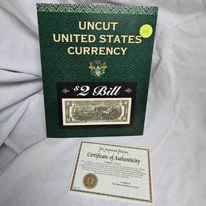 lot 36 image: UNCUT $2 Bills, 2003 A Series(3) wCOA