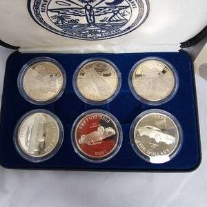 lot 40 image: 1998 $5 Chevy Commemoritive Coin Set (6) Featuring GM Classics wCOA