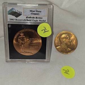 lot 74 image: Bronze Franklin Roosevelt Coin and NGS Roosevelt 1oz Bald Eagle, Mint State Copper