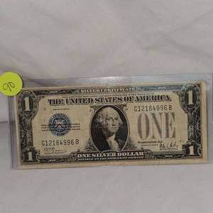 lot 90 image: 1928-B $1 Silver Certificate Funny Back