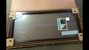 lot 6 image: Andersen 70-12 in. x 79-12 in. 200 Series Black Right-Hand Perma-Shield Sliding Patio Door with Black Interior, Fixed Panel Customer Returns See Pictures