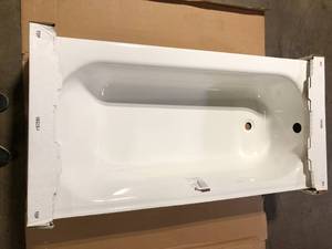 lot 14 image: Bootz Industries Bootzcast 60 in. x 30 in. Soaking Alcove Bathtub with Left Drain in White    Customer Returns See Pictures