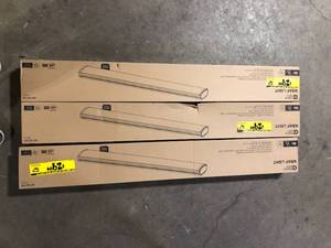 lot 23 image: Lot of Commercial Electric 1-Pack 4 ft. 3600 Lumens LED Ceiling Wraparound Light 120V Hardwire Garage Laundry Room Shop Light Bright White 4000K customer return see pictures