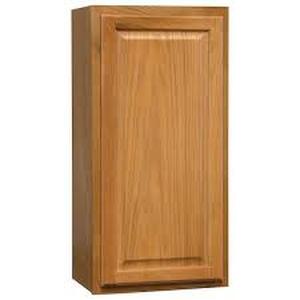 lot 54 image: Hampton Bay Hampton 18 in. W x 12 in. D x 36 in. H Assembled Wall Cabinet in Medium Oak customer return see pictures