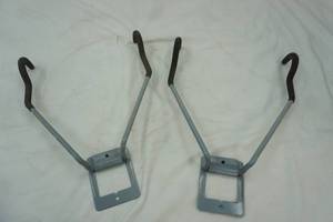 lot 38 image: Wall-Mounted Flip-Up Storage Hangers (2ct)